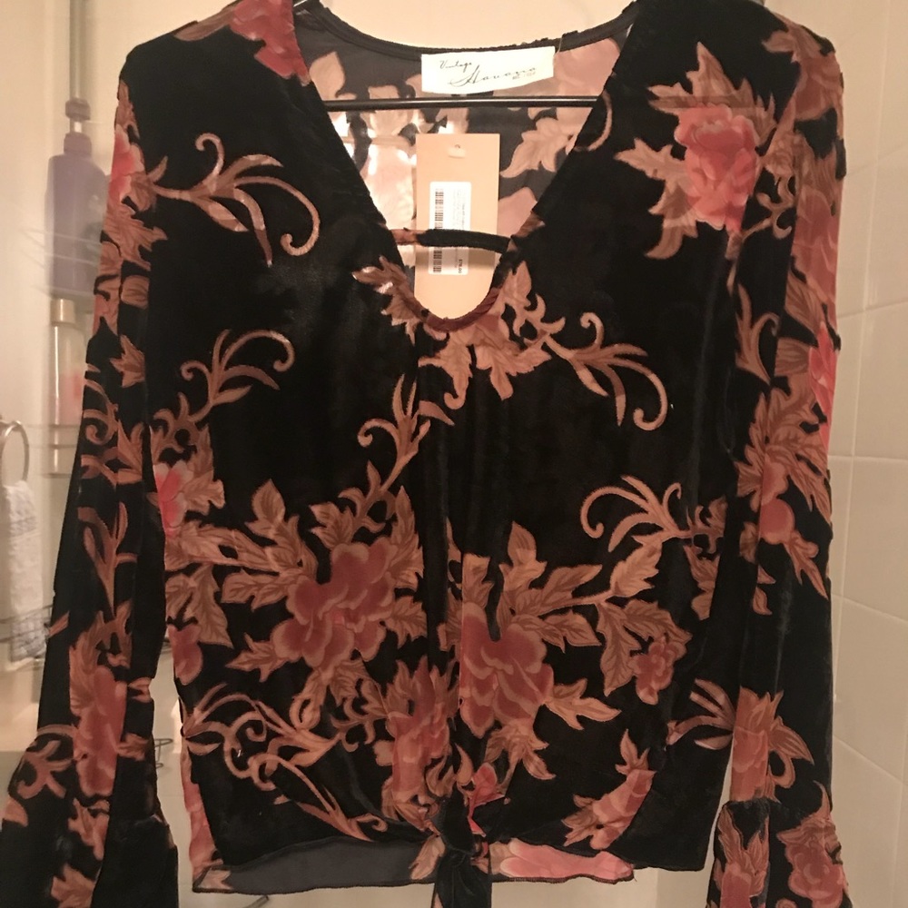 Long sleeved floral blouse